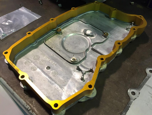 Mount the extension to the oil pan — photo 1