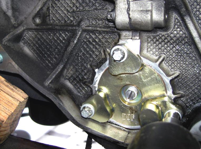 Install the new flange bolts — photo 1