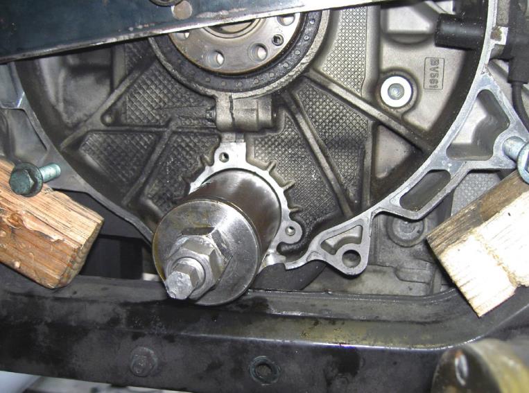 Position the bearing removal tool — photo 1