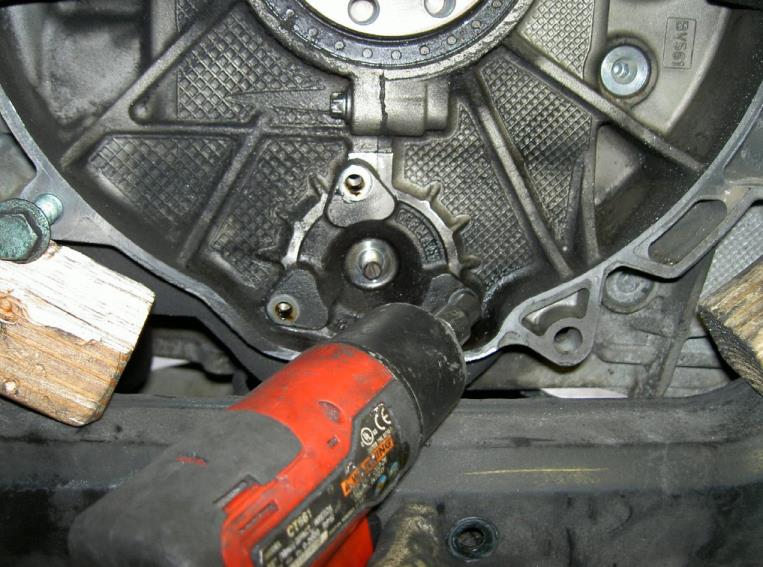 Remove the flange bolts — photo 1