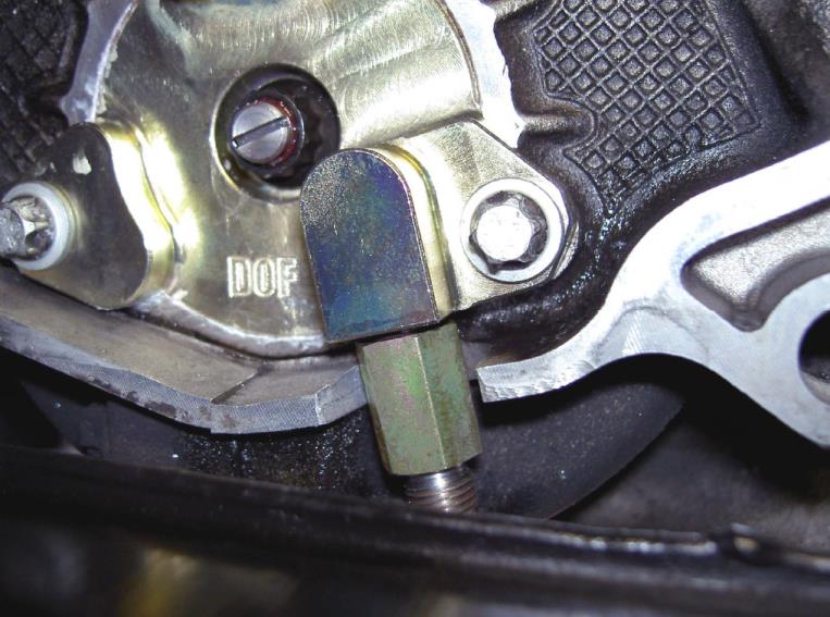 Install the straight hose adapter — photo 1
