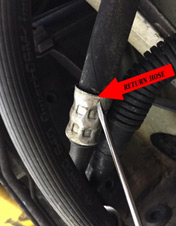 Connect the first return hose — photo 1