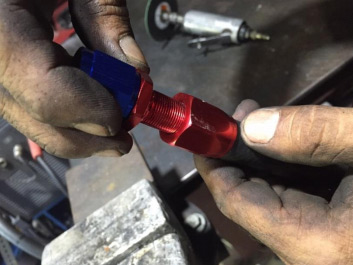 Insert the hoses into the AN8 fittings — photo 2